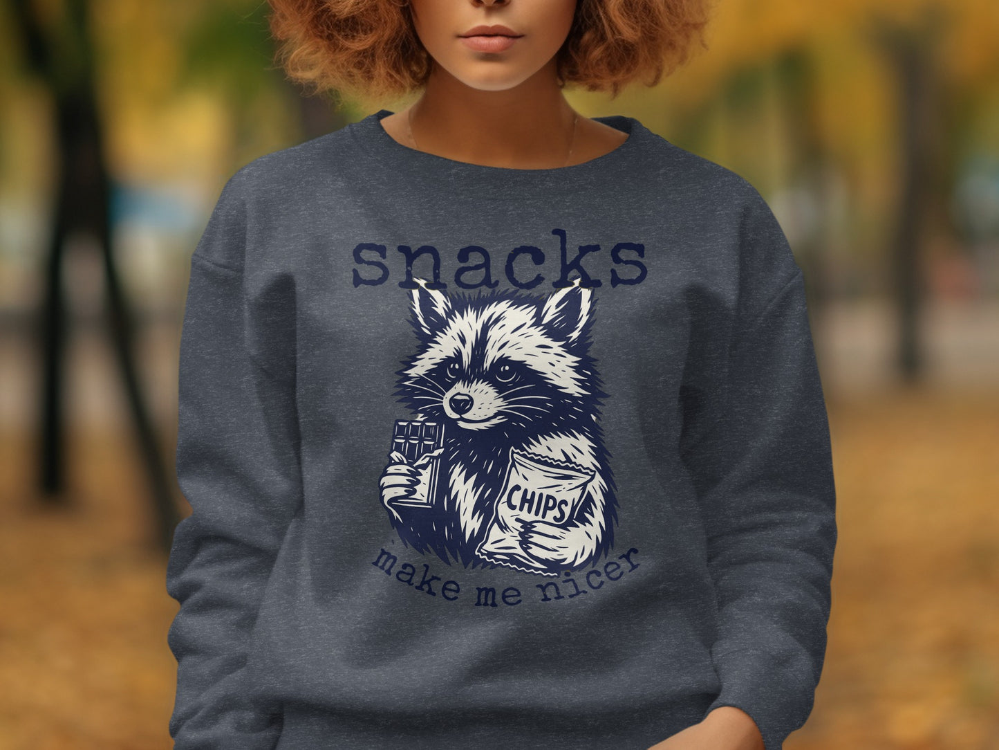 Snacks Make Me Nicer Raccoon Graphic Shirt product type