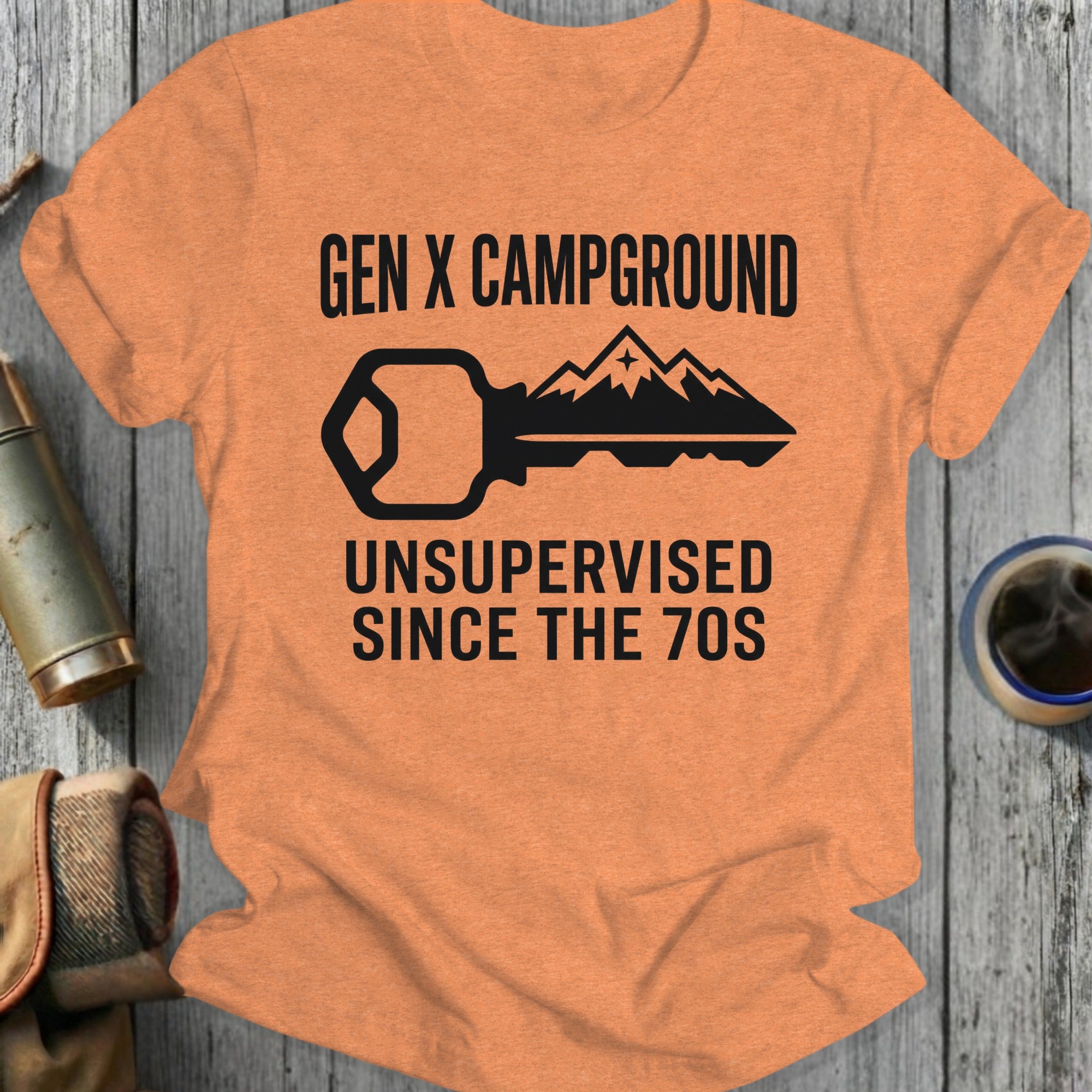 Gen X Campground Unsupervised Since The 70s t-shirt with key and mountain graphic.