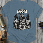 Bear sitting on a toilet in the woods, saying "I DO!".