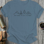 Blue t-shirt with "Be Kind to All Climbs" text and mountain, campfire, tree, tent illustration.