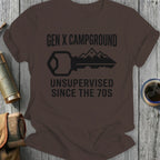 Gen X Campground Unsupervised Since the 70s graphic on a brown t-shirt.