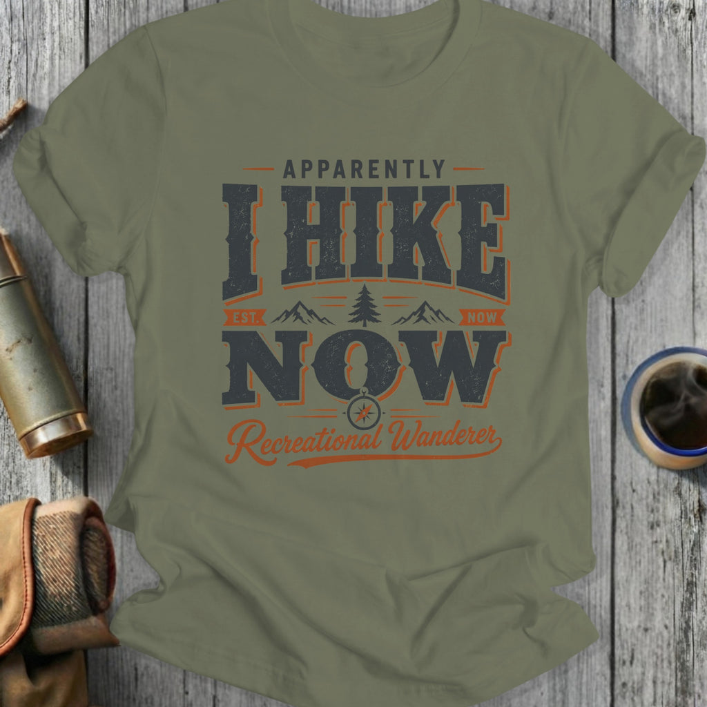 T-shirt with "Apparently I Hike Now, Est. Now, Recreational Wanderer" text and mountains.