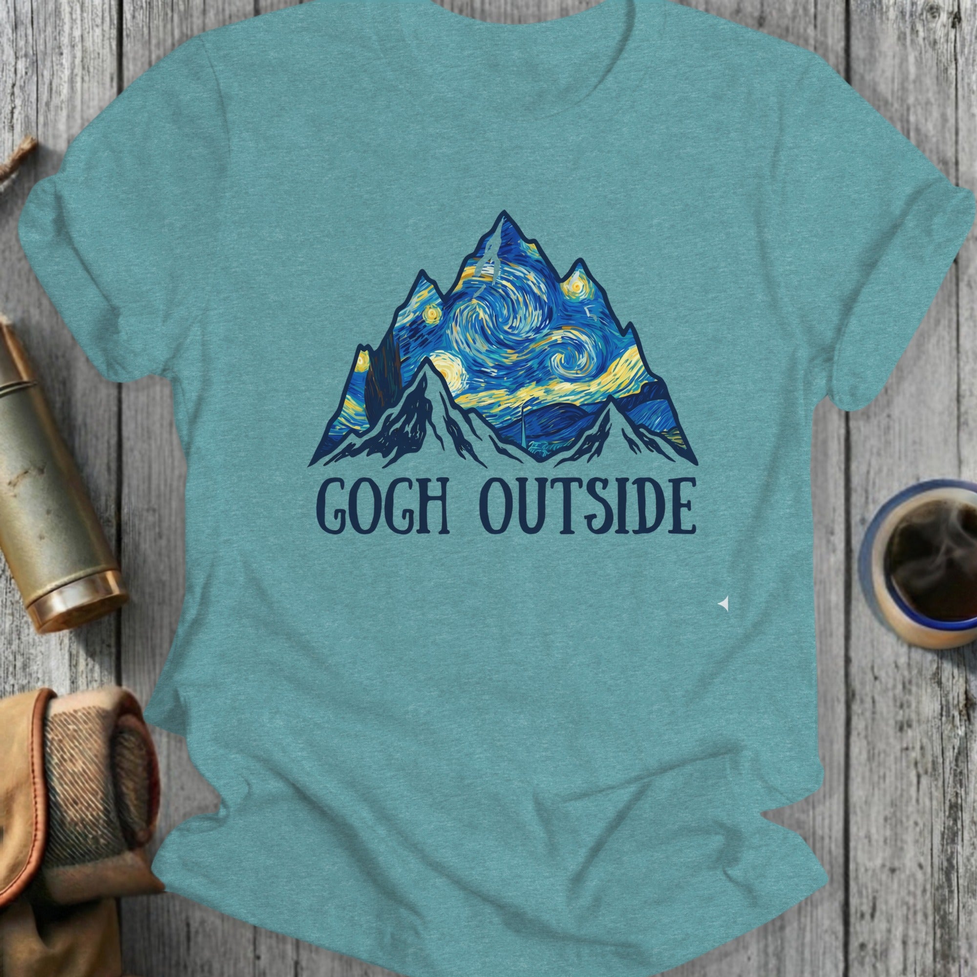 Mountains with starry sky and text "GOGH OUTSIDE" on a t-shirt.