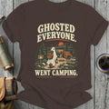 Ghosted everyone went camping text with a ghost walking in a forest camping scene.