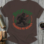 Bigfoot running with a hot dog, text "Bigfoot grabbed my wiener".