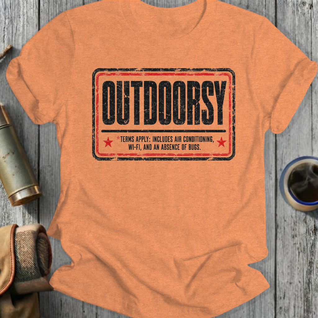 Orange t-shirt with "Outdoorsy" and humorous terms in a distressed stamp graphic.