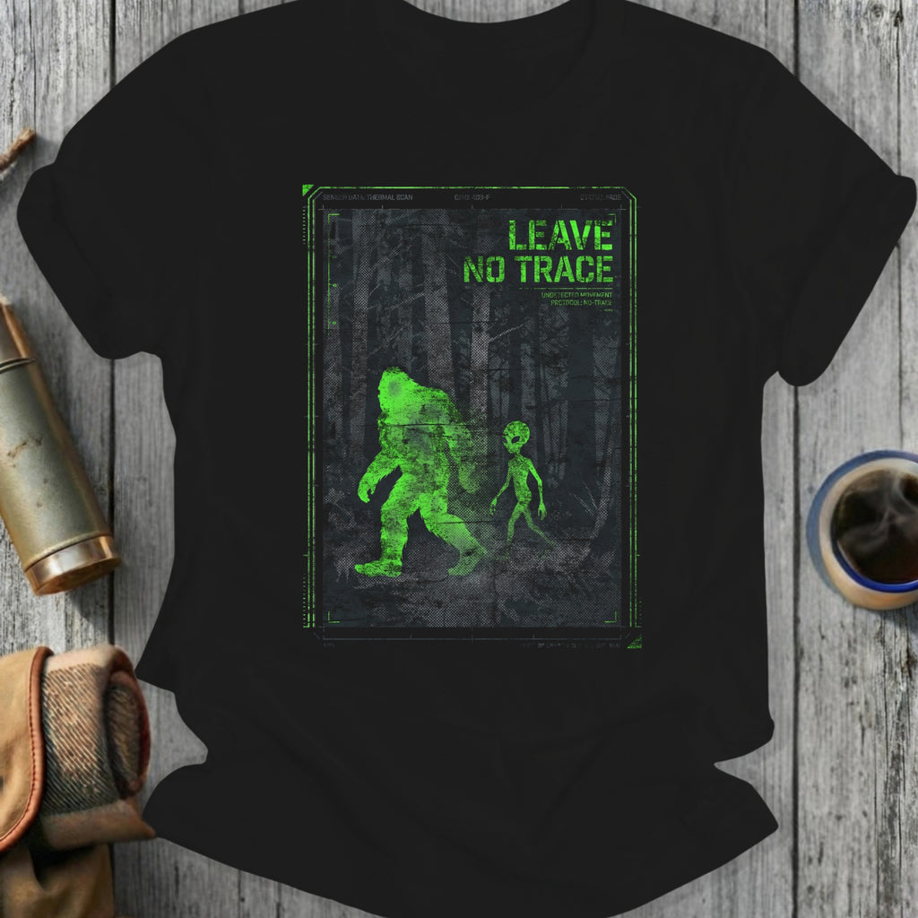 Green Bigfoot and alien silhouette on dark forest background with "Leave No Trace" text.