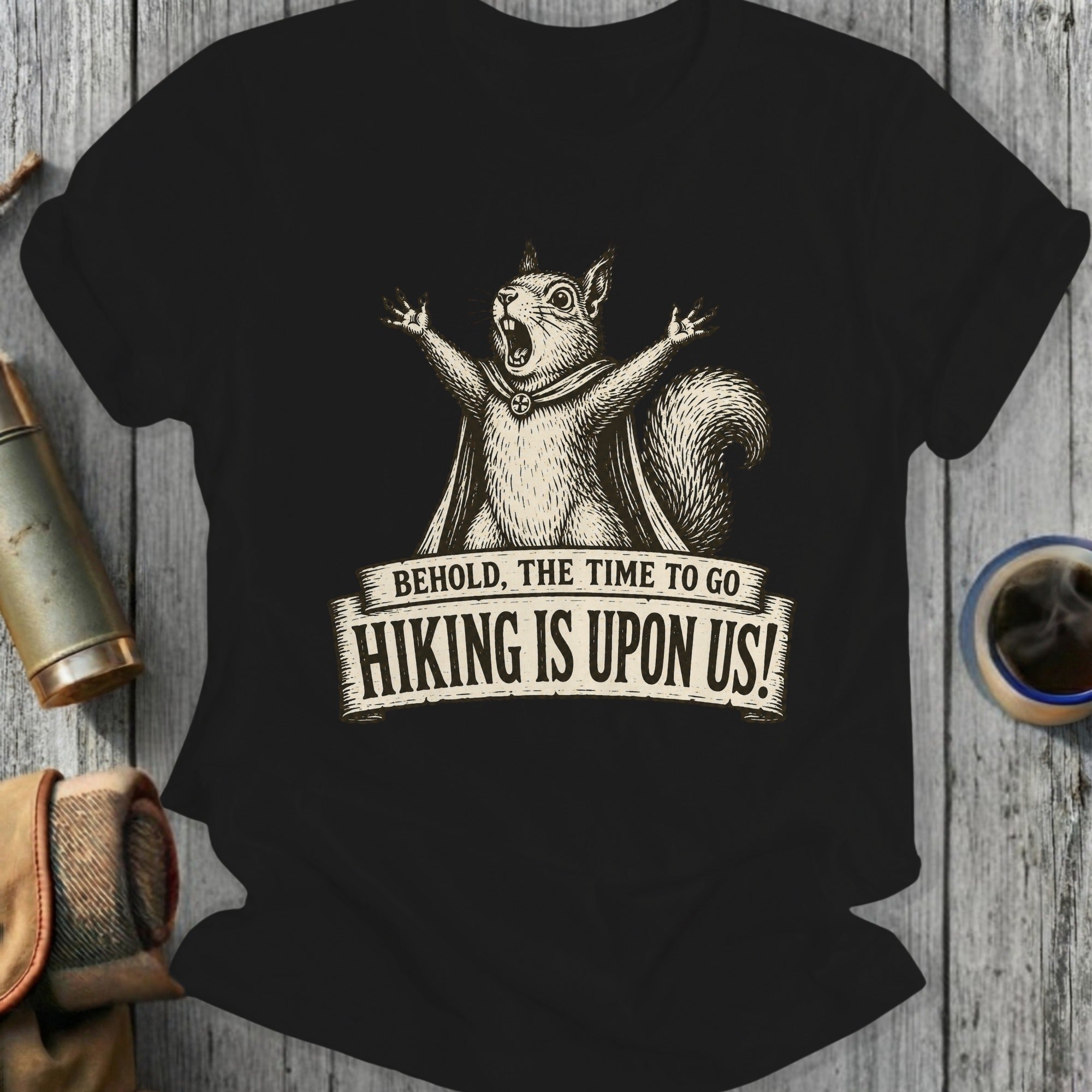Black t-shirt with a vintage illustration of a squirrel in a cape and banner text.