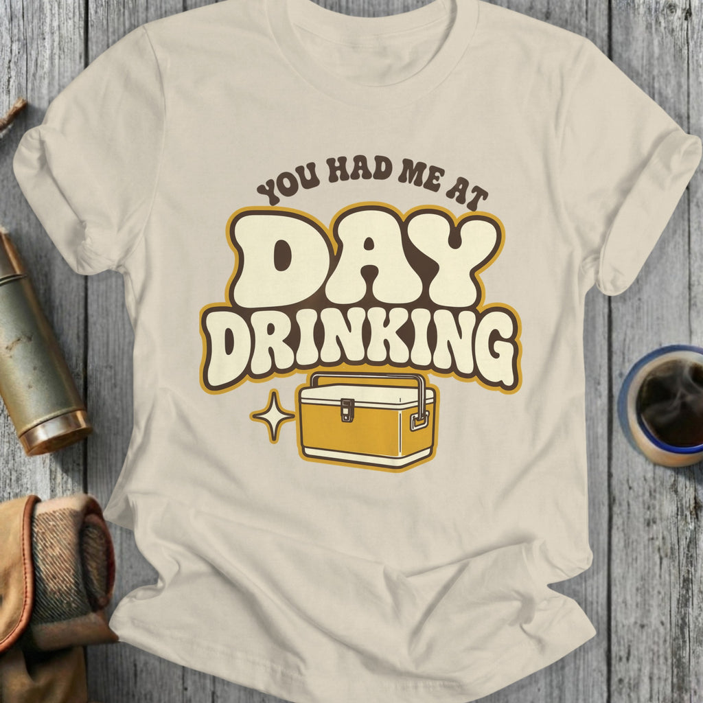 T-shirt with "You Had Me At Day Drinking" text and cooler graphic.