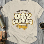 T-shirt with "You Had Me At Day Drinking" text and cooler graphic.