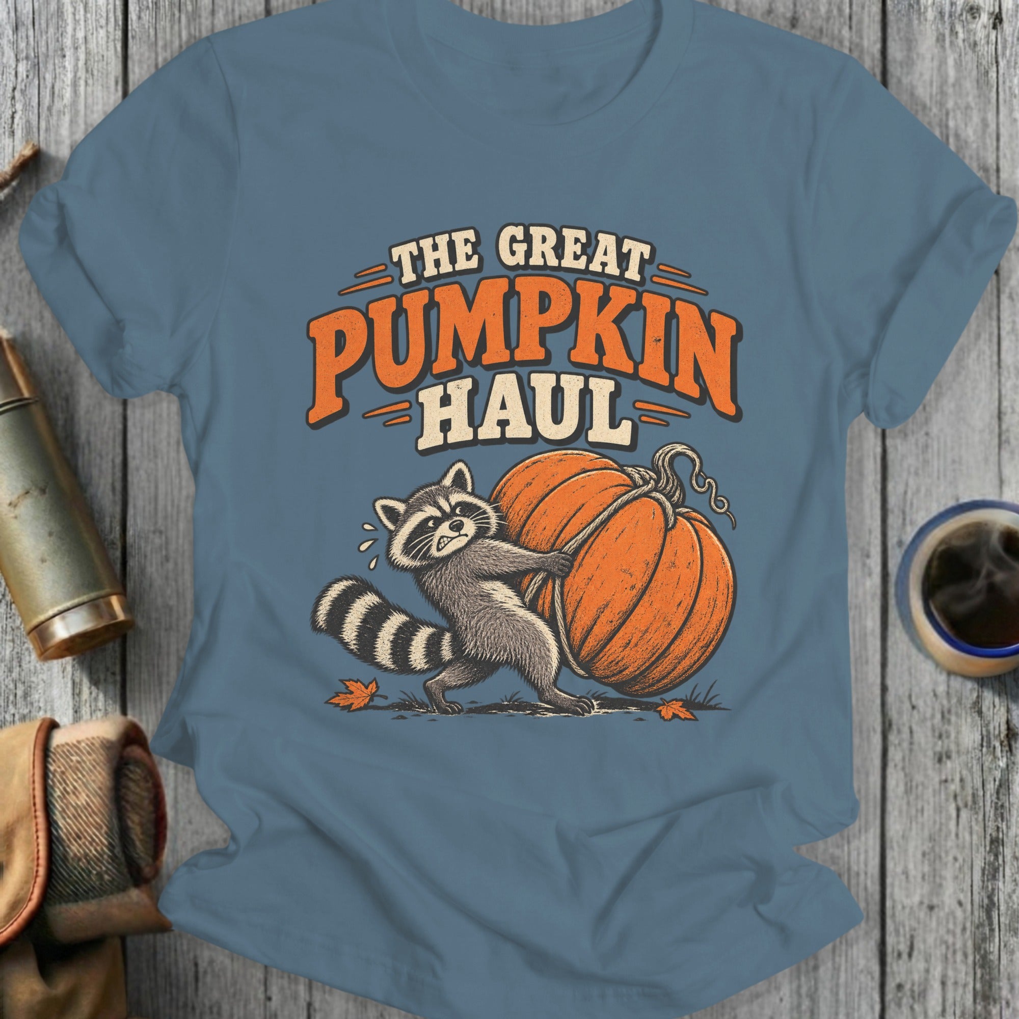 Raccoon struggling to roll a large pumpkin with text "The Great Pumpkin Haul".