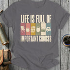 Grey t-shirt with text "LIFE IS FULL OF IMPORTANT CHOICES" and camping icons.