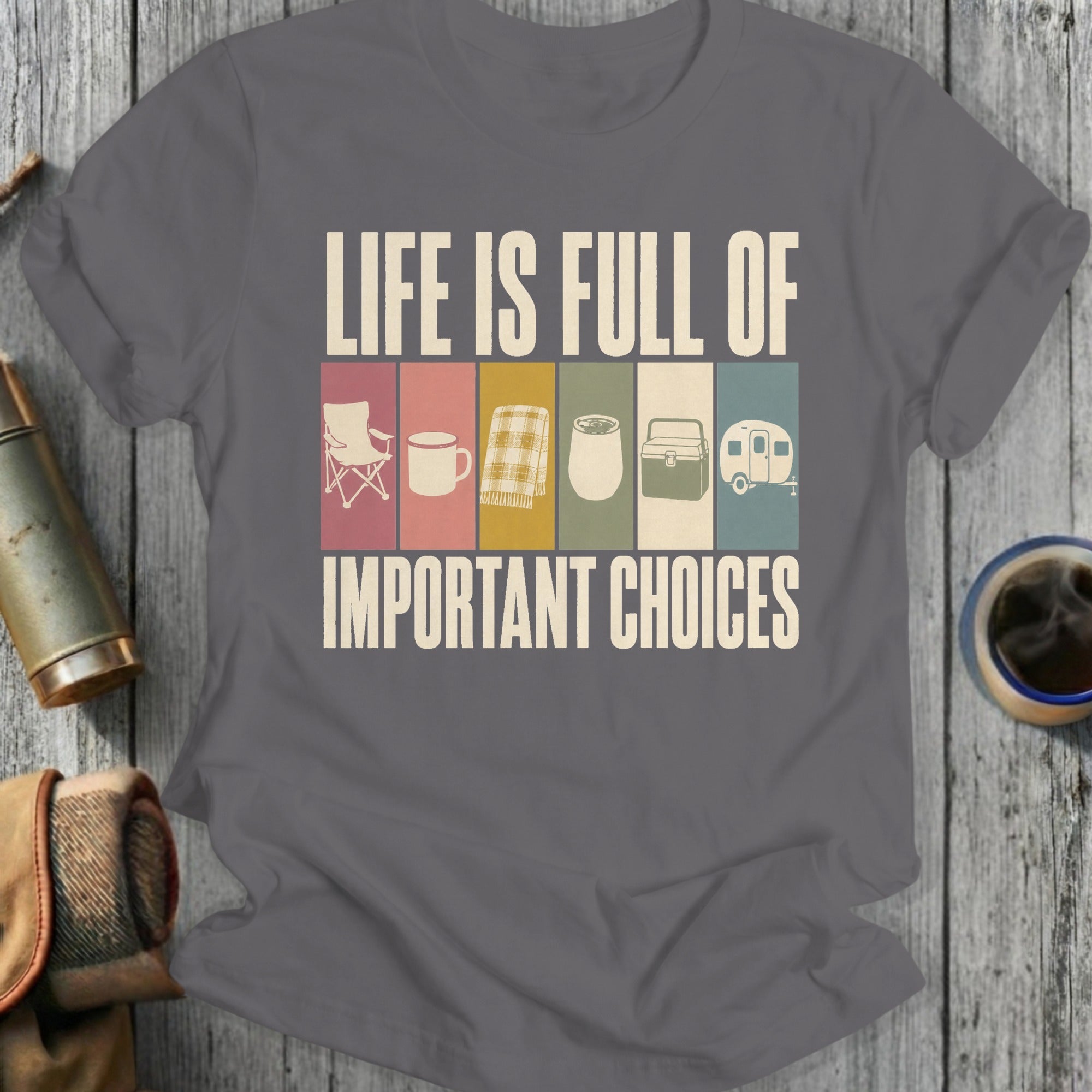 Grey t-shirt with text "LIFE IS FULL OF IMPORTANT CHOICES" and camping icons.