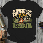 Adventure before Dementia text with camping scene: tent, campfire, and RV.