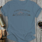 Blue t-shirt with a graphic of "GO WHERE YOU FEEL MOST ALIVE" over mountains.