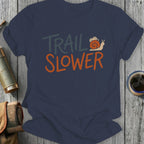 Navy t-shirt with "TRAIL SLOWER" text and a snail graphic.