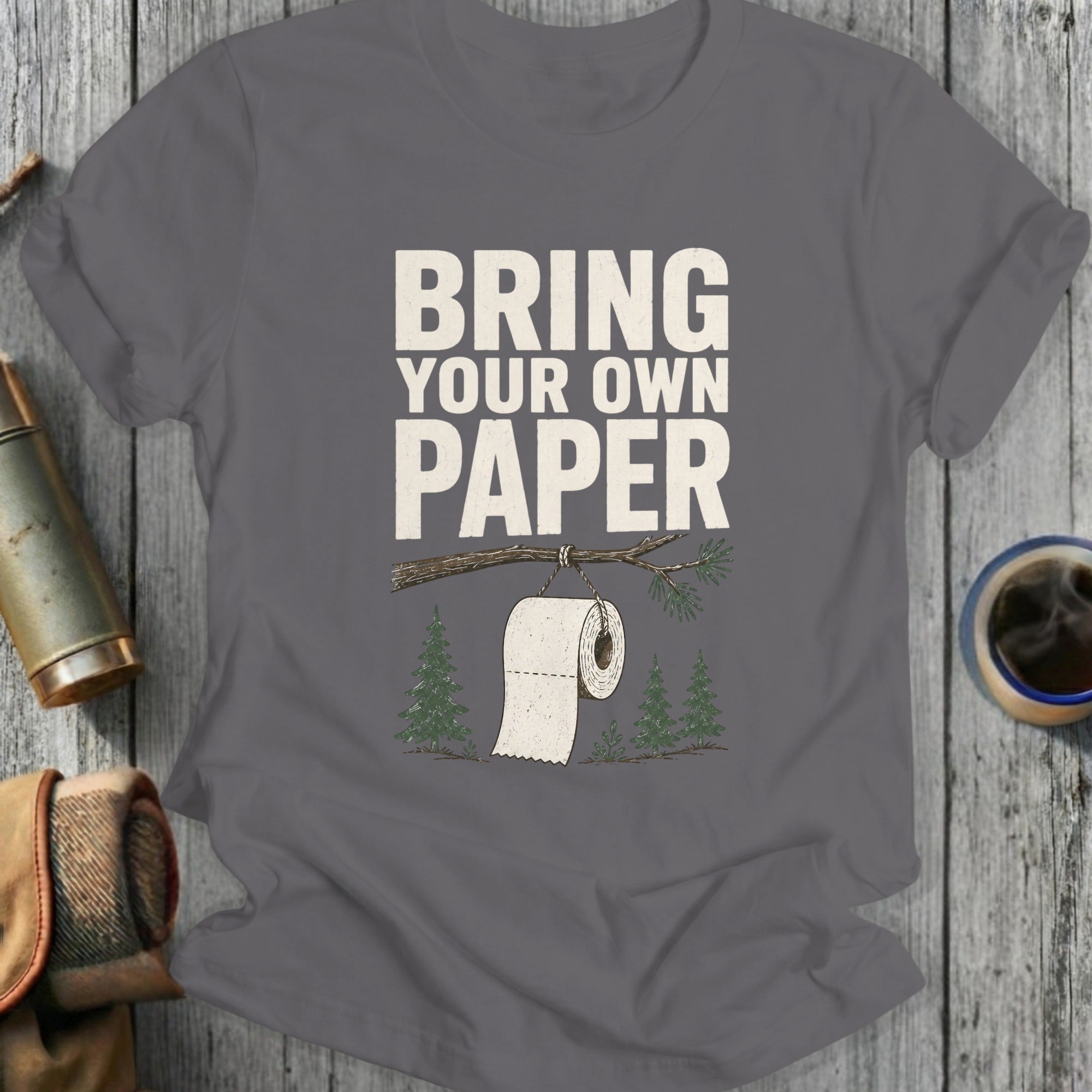 Gray t-shirt with "BRING YOUR OWN PAPER" text and toilet paper roll graphic.
