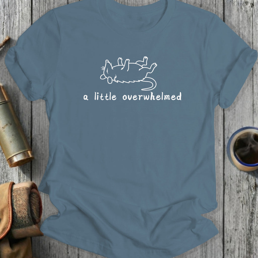 Blue t-shirt with white line drawing of a rat and text "a little overwhelmed".