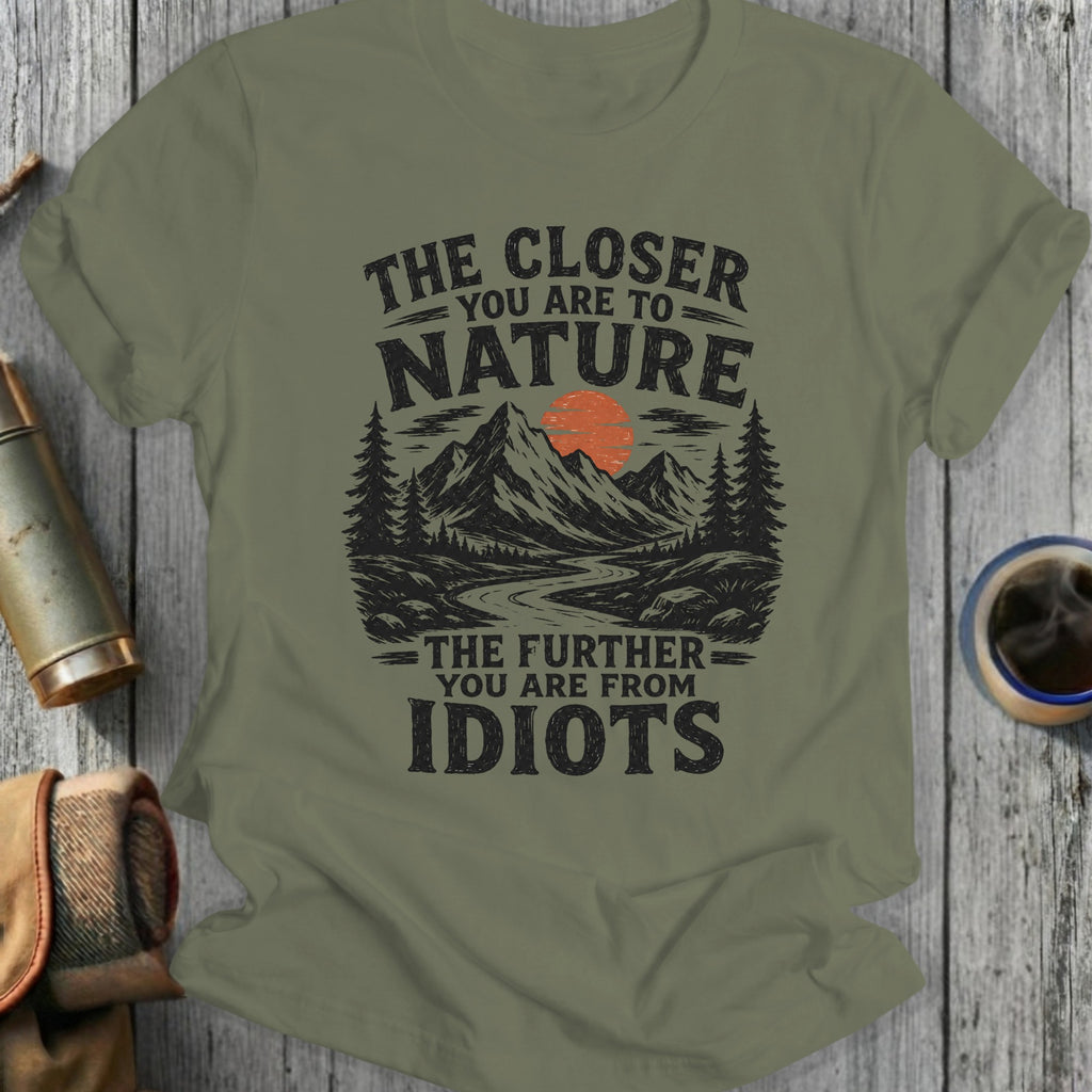 Olive green t-shirt with "The Closer You Are To Nature, The Further You Are From Idiots" text.