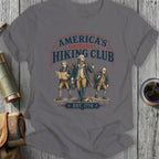 America's Original Hiking Club EST. 1776 graphic on a gray t-shirt.