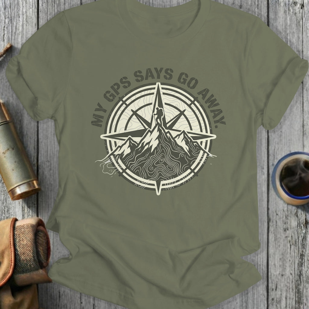 Green t-shirt with compass and mountain graphic, text reads "MY GPS SAYS GO AWAY."