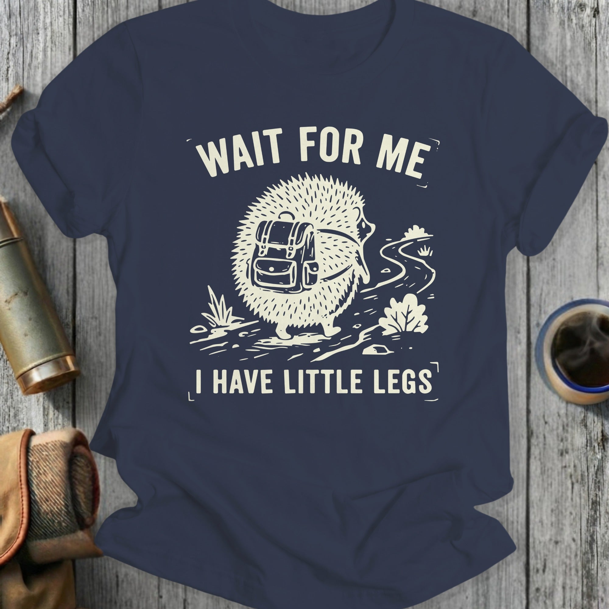 T-shirt with a hedgehog carrying a backpack and the text "WAIT FOR ME I HAVE LITTLE LEGS".