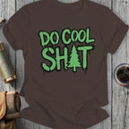Brown t-shirt with "DO COOL SH*T" and a Christmas tree graphic.