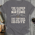 Gray t-shirt with text "The Closer You Are To Nature The Further You Are From Idiots".
