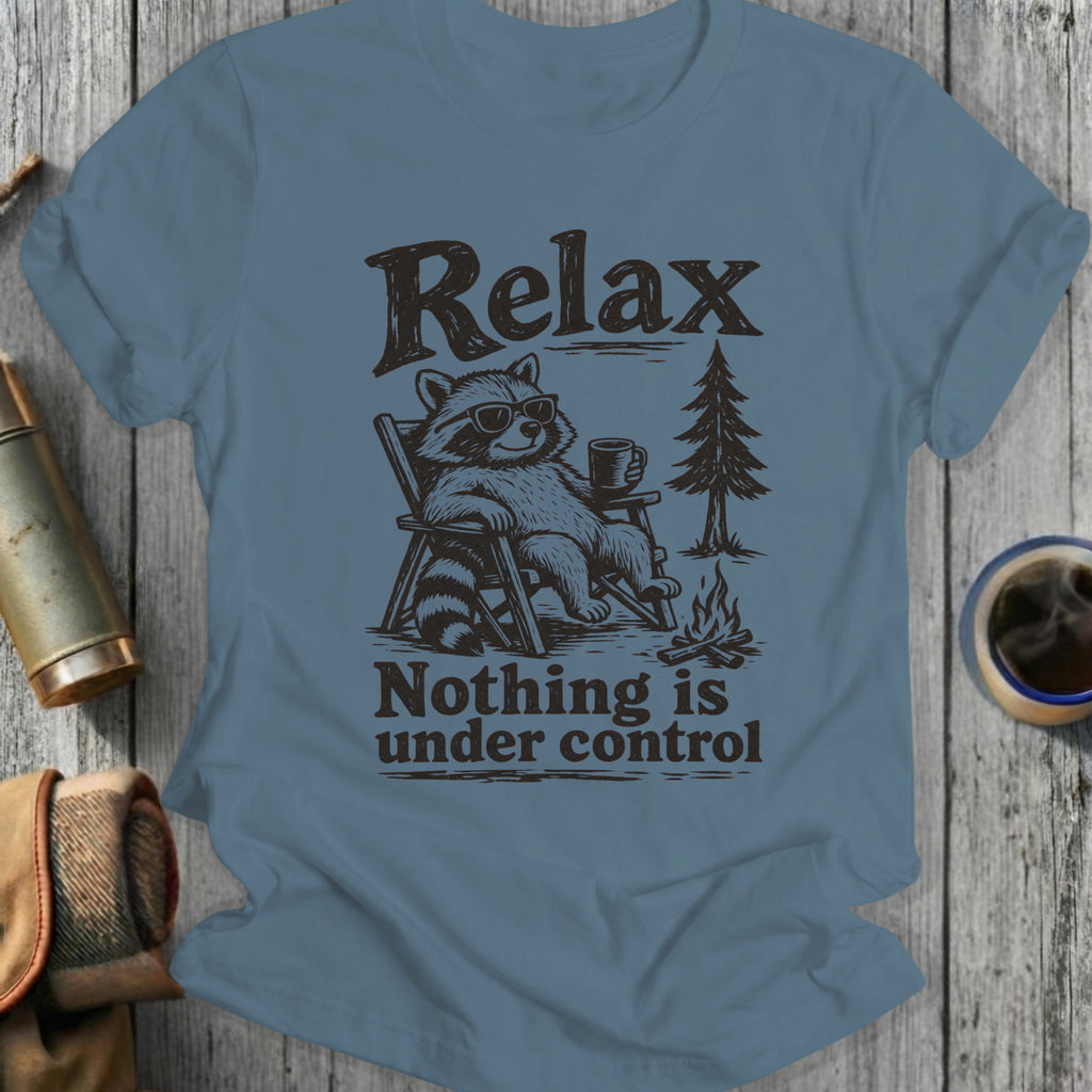 T-shirt graphic with raccoon relaxing, holding coffee and text "Relax Nothing is under control".