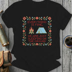Black t-shirt with cross-stitch design of tent, campfire, and text.