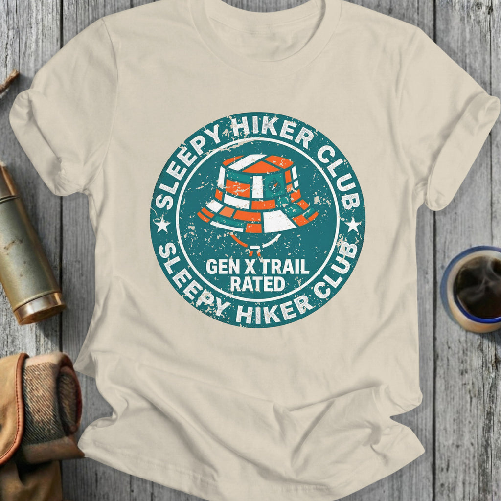 Distressed logo for Sleepy Hiker Club, Gen X Rated, on a cream t-shirt.