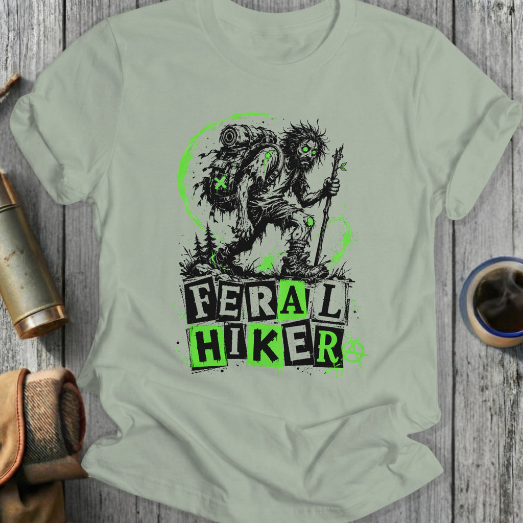 Feral Hiker t-shirt featuring a zombie hiker with a backpack and staff.