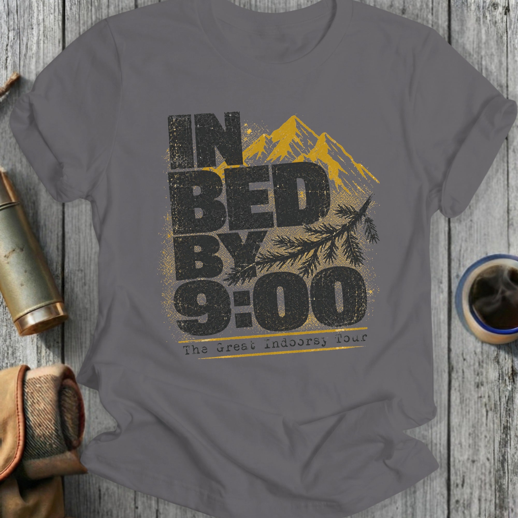 Gray t-shirt with "IN BED BY 9:00" and mountains, plus "The Great Indoorsy Tour".
