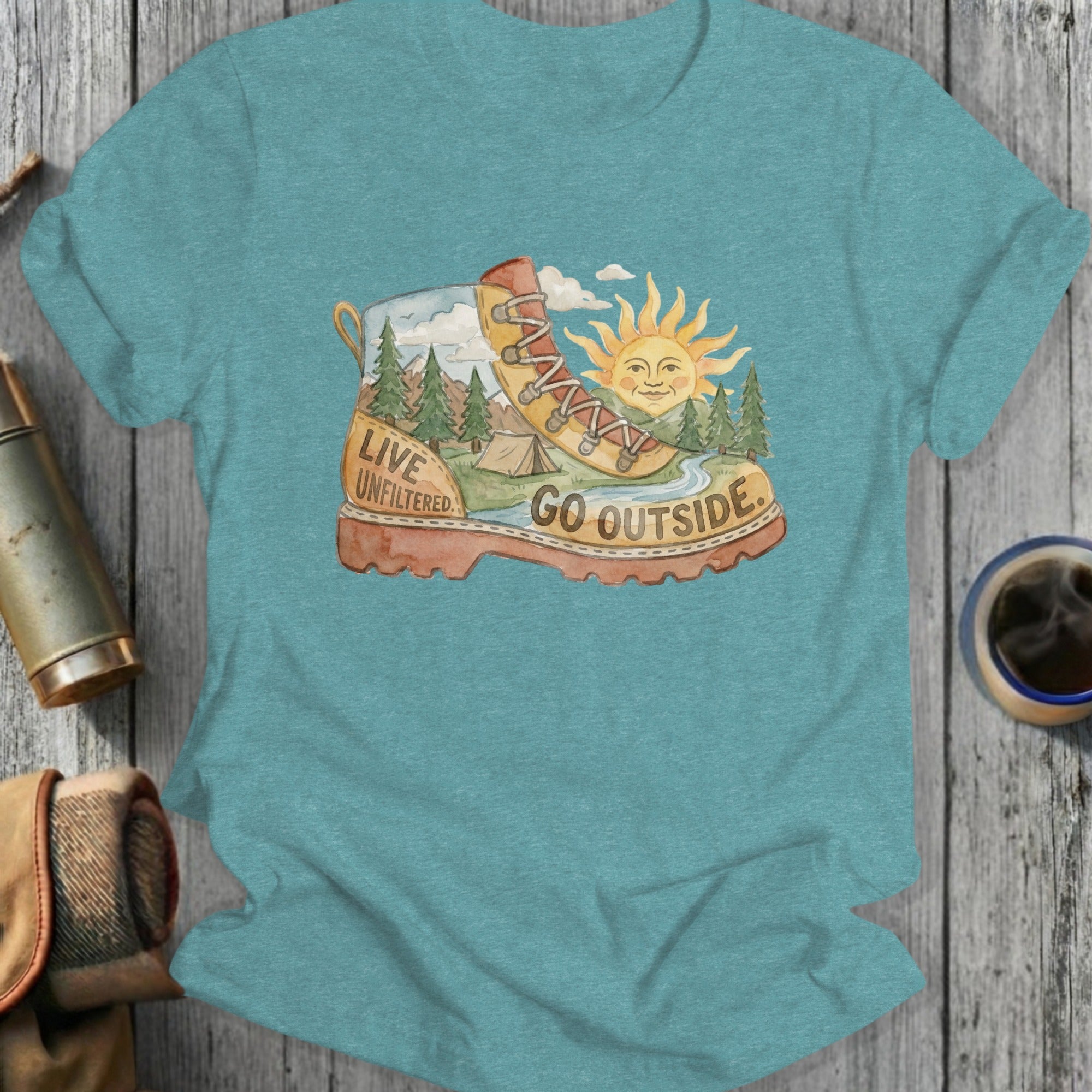 Watercolor boot with tents, mountains, sun, and text "LIVE UNFILTERED. GO OUTSIDE."