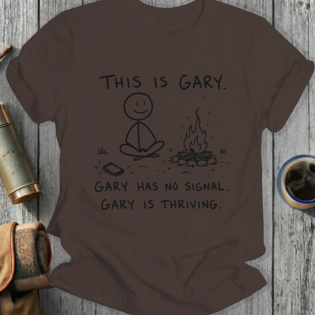 T-shirt with stick figure Gary meditating by a campfire, text reads "This is Gary. Gary has no signal. Gary is thriving."