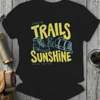 Black t-shirt with "Chasing Trails & Sunshine" text, hiking boot, and rolled sleeping bag.