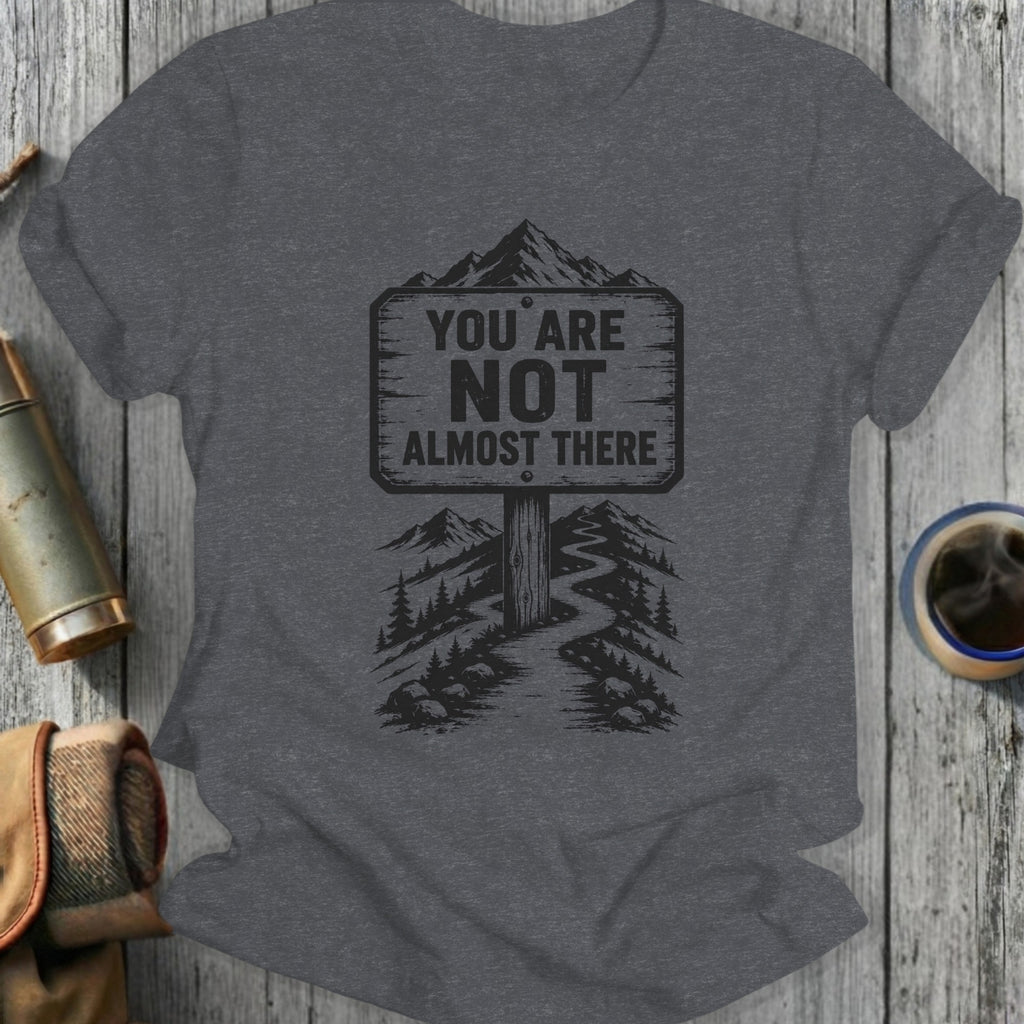 Dark grey t-shirt with "You Are Not Almost There" mountain path graphic.