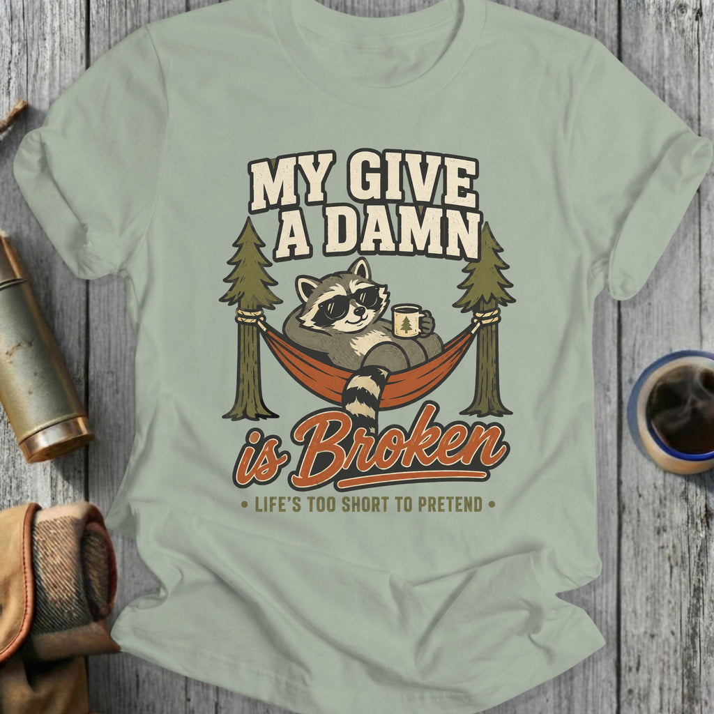 Raccoon in hammock with coffee, reads "My Give a Damn is Broken."