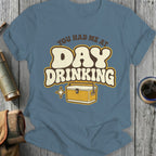 Blue t-shirt with "You Had Me At Day Drinking" and a cooler illustration.