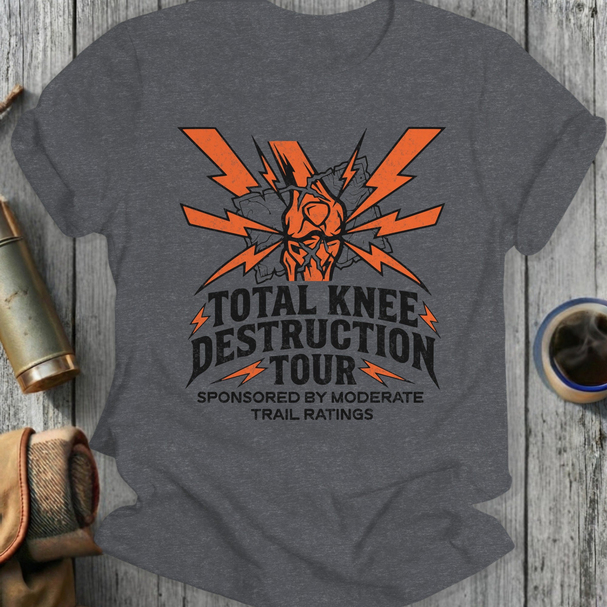T-shirt with "Total Knee Destruction Tour" graphic in orange.