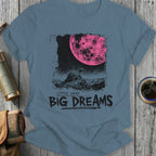 T-shirt with graphic of a turtle on rocks under a pink moon, text "LITTLE LEGS BIG DREAMS".