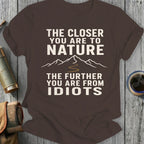 Brown t-shirt with text "The closer you are to nature the further you are from idiots."