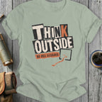 T-shirt with "THINK OUTSIDE NO BOX REQUIRED" graphic and orange arrow.