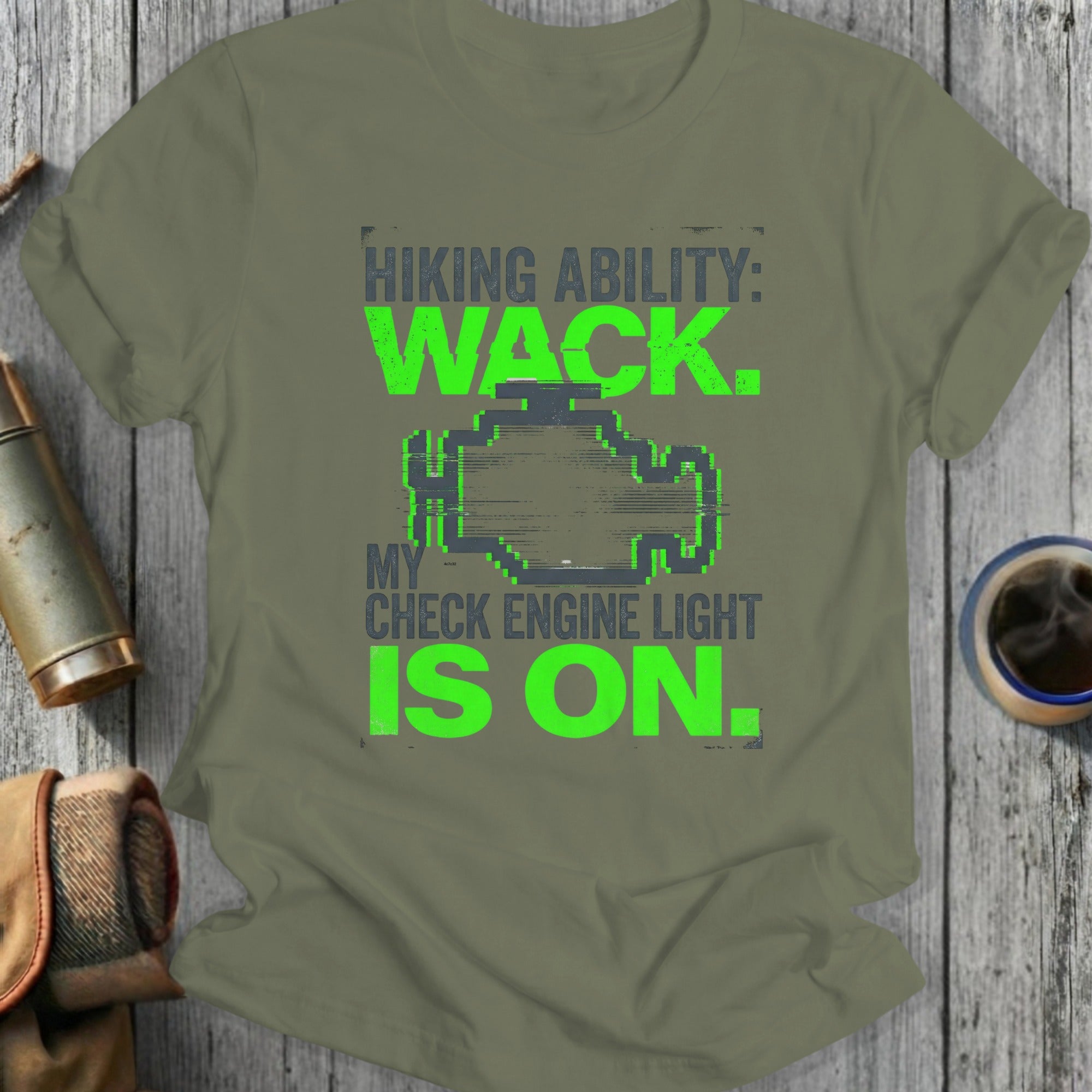 Green t-shirt with "Hiking Ability: WACK. My Check Engine Light is On."