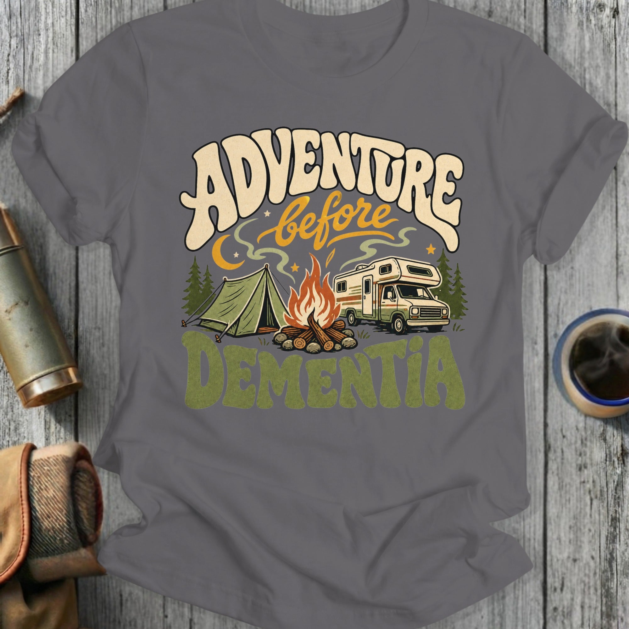 Adventure before Dementia graphic with camper, tent, and campfire design.