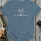 T-shirt with white outline of a raccoon and text "a little trashy".