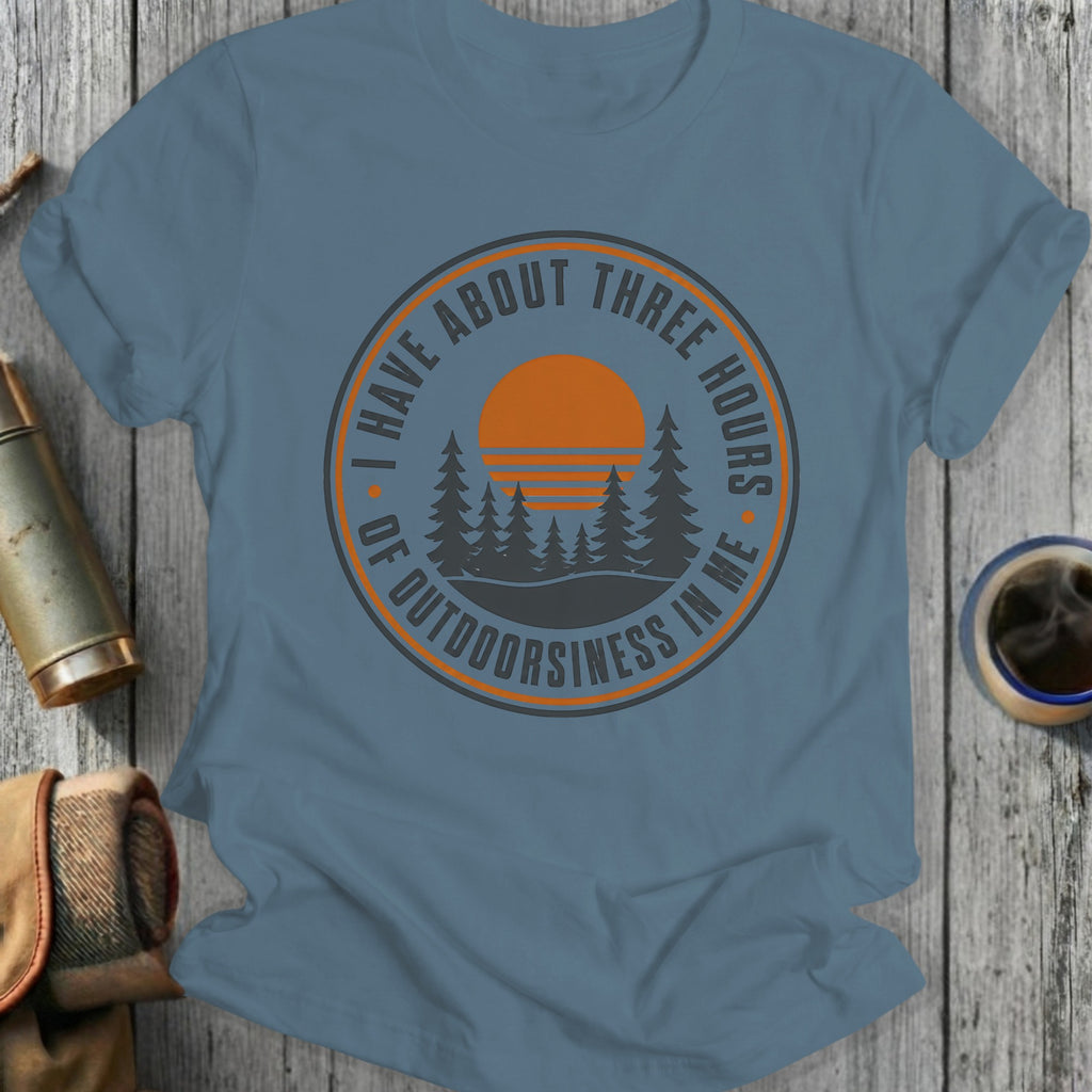 Blue t-shirt with circular graphic: "I HAVE ABOUT THREE HOURS OF OUTDOORSINESS IN ME".