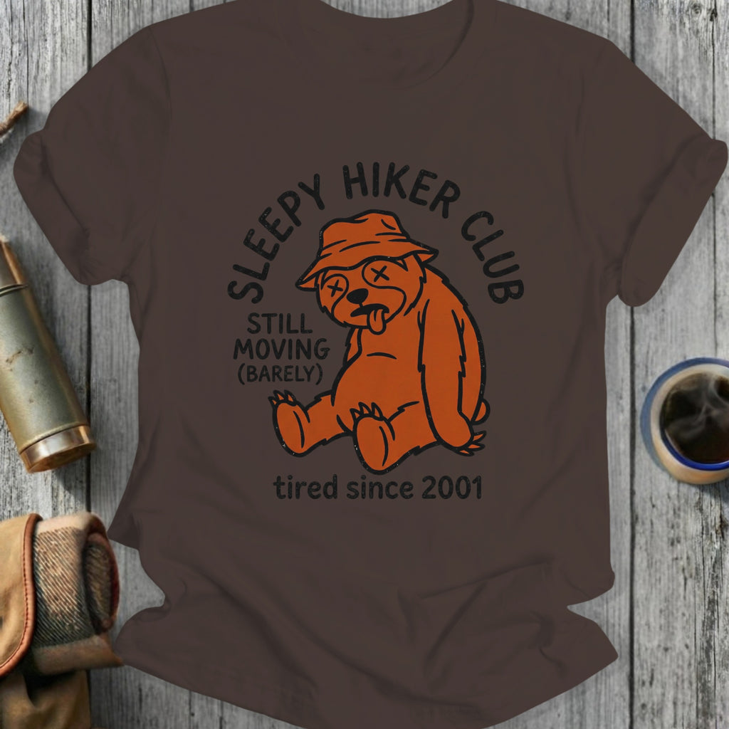 Brown t-shirt with "Sleepy Hiker Club" text and a sloth graphic.