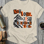 Cream t-shirt with "Not Lost Just Ignoring You" text and mountain graphic.