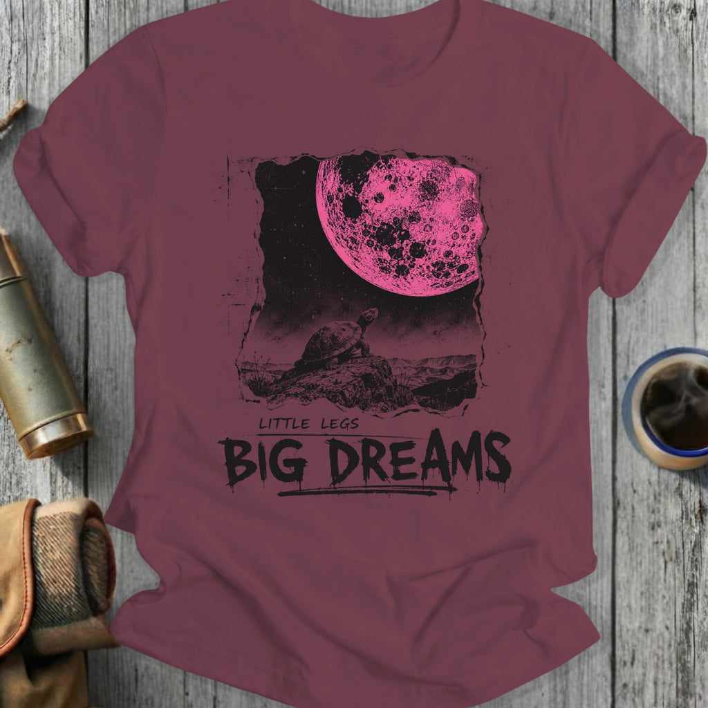 T-shirt with distressed graphic of a turtle looking at a large pink moon.